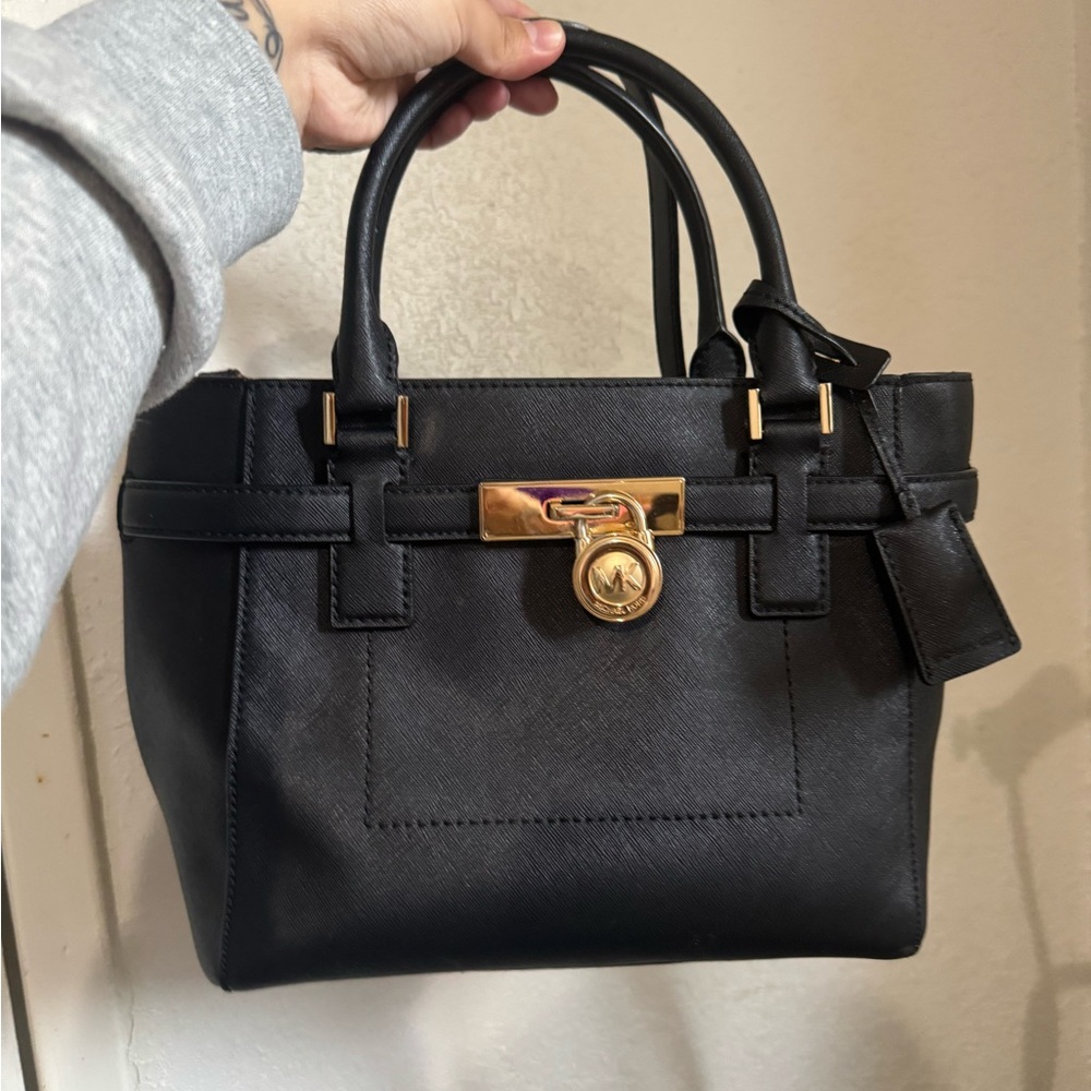 Black Leather Handbag with Gold Accents